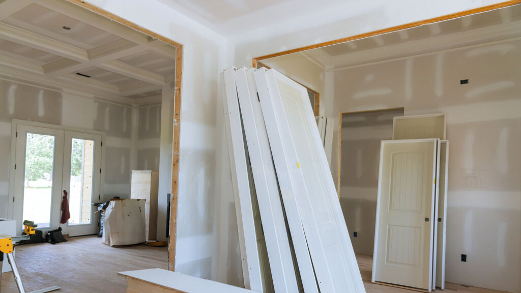Stacked,White,Doors,Unfinished,Walls,Indicate,Ongoing,Renovation,Work,In