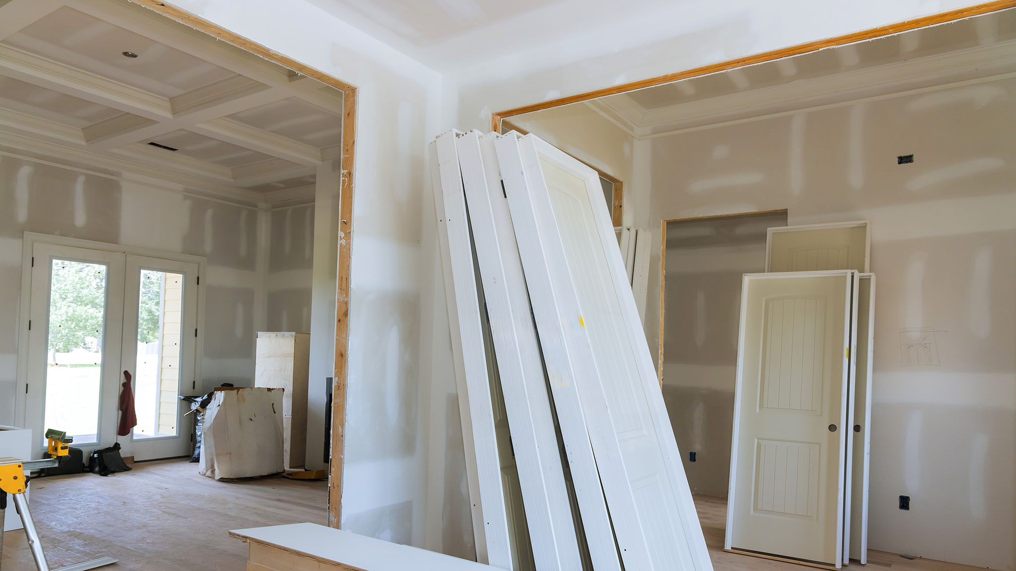 Stacked,White,Doors,Unfinished,Walls,Indicate,Ongoing,Renovation,Work,In